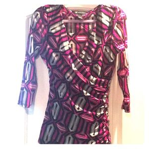 INC top with side touching. Front is lined